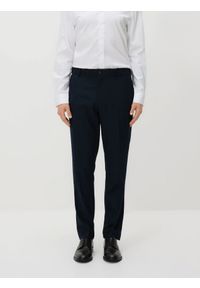 Reserved - Spodnie garniturowe slim fit - granatowy. Kolor: niebieski. Materiał: tkanina, wiskoza #1
