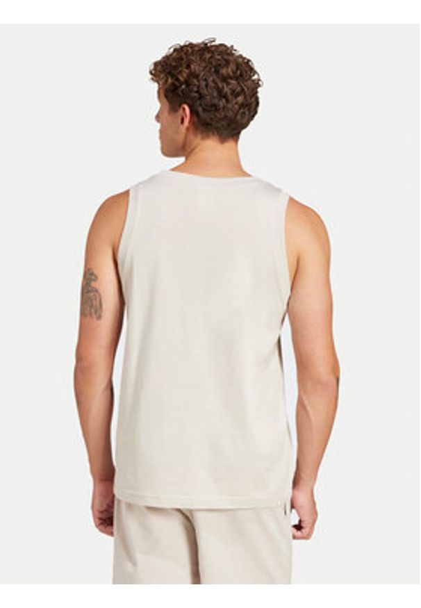 Adidas - adidas Tank top Essentials Small Logo IN6177 Beżowy Regular Fit. Kolor: beżowy. Materiał: bawełna