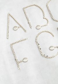 Born2be - Biały Oversizowy T-shirt z Bawełny Zdobiony Haftem z Cekinami Pidella. Okazja: na co dzień. Kolor: biały. Materiał: bawełna. Wzór: haft, aplikacja. Styl: casual, elegancki #4