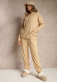Renee - Ciemnobeżowy Komplet Dresowy Spodnie i Bluza z Kapturem i Kangurową Kieszenią Lotilea. Kolor: beżowy. Materiał: dresówka