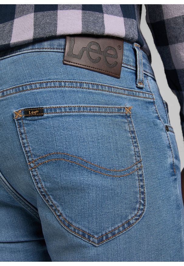 Lee - LEE RIDER MĘSKIE SPODNIE JEANSOWE LIGHT WORN L701SQBH 112319709