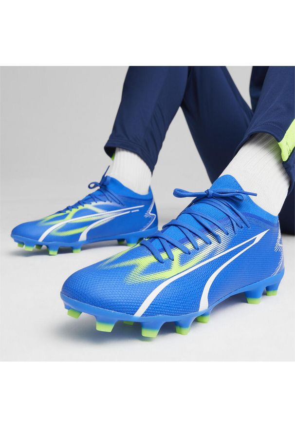 Buty piłkarskie męskie Puma Ultra Match Fg ag. Kolor: zielony, niebieski, wielokolorowy, biały. Materiał: guma, syntetyk, tkanina, materiał. Sport: piłka nożna
