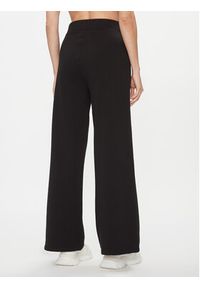 Calvin Klein Jeans Spodnie dresowe Ck Embro Badge Knit Pant J20J222597 Czarny Regular Fit. Kolor: czarny. Materiał: bawełna, dresówka #3
