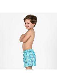OLAIAN - Spodenki surfingowe dla dzieci Olaian 100 Palm. Kolor: niebieski. Materiał: materiał, poliester. Długość: krótkie