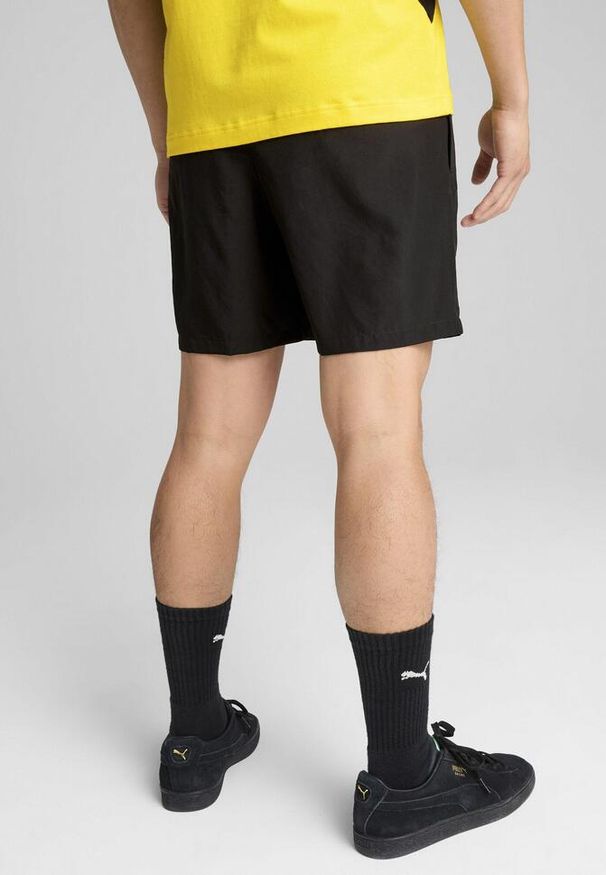 Puma - Męskie szorty Borussia Dortmund ftblARCHIVE PUMA Black Faster Yellow. Kolor: czarny, żółty, wielokolorowy. Wzór: aplikacja
