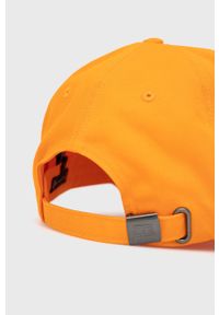 TOMMY HILFIGER - Tommy Hilfiger czapka bawełniana kolor pomarańczowy gładka. Kolor: pomarańczowy. Materiał: bawełna. Wzór: gładki