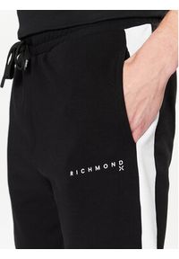 John Richmond Spodnie dresowe UMP23032PA Czarny Regular Fit. Kolor: czarny. Materiał: dresówka, syntetyk