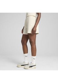 Puma - Damskie prążkowane szorty ESS ELEVATED 5" z wysokim stanem PUMA. Stan: podwyższony. Kolor: biały, wielokolorowy, beżowy. Materiał: prążkowany. Długość: krótkie