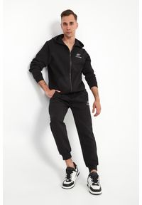 Plein Sport - Spodnie dresowe męskie PLEIN SPORT. Materiał: dresówka. Styl: sportowy #1