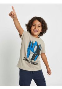 Sinsay - Bawełniana koszulka z nadrukiem Transformers - kremowy. Kolor: kremowy. Materiał: bawełna. Wzór: nadruk #1