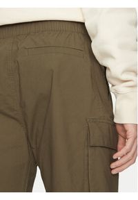 Calvin Klein Jeans Szorty materiałowe J30J327376 Khaki Regular Fit. Kolor: brązowy. Materiał: bawełna