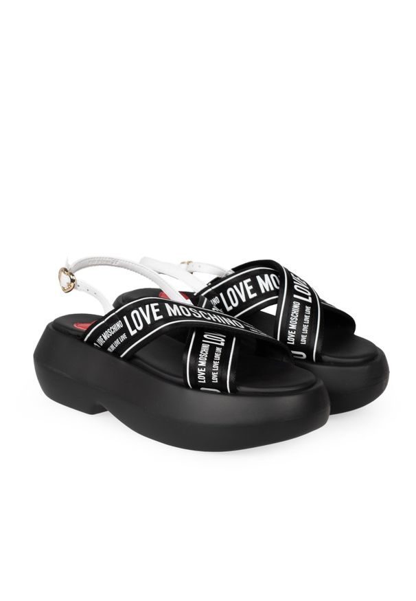 Love Moschino Sandały | JA16257I0IIX6 | Kobieta | Czarny, Biały. Okazja: na co dzień, na spacer. Zapięcie: pasek. Kolor: czarny, biały, wielokolorowy. Materiał: skóra. Wzór: nadruk. Styl: casual, elegancki