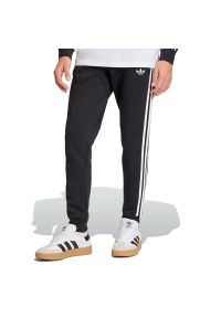 Adidas - Spodnie męskie adidas Originals 3-Stripes KE3562 - czarne. Kolor: czarny. Materiał: materiał, dresówka, poliester, bawełna #1