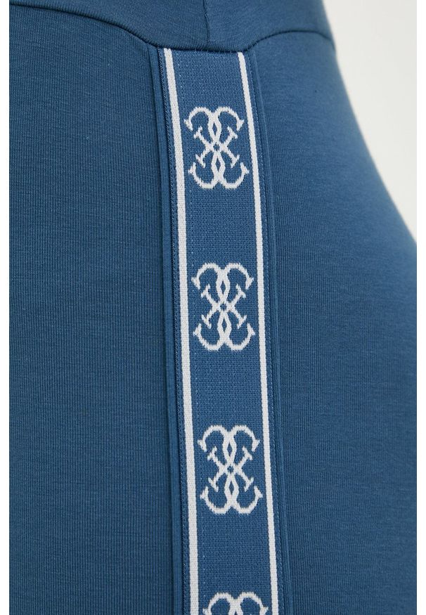 Guess legginsy damskie z nadrukiem. Stan: podwyższony. Kolor: niebieski. Wzór: nadruk