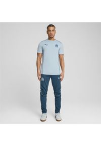 Puma - Męskie spodnie Casuals Olympique Marsylia PUMA Ocean Tropic Turquoise Surf Blue. Kolor: niebieski. Sport: piłka nożna