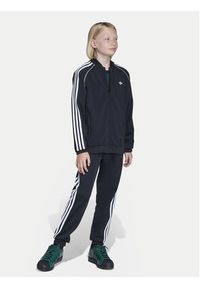 Adidas - adidas Spodnie dresowe adicolor SST KE2862 Czarny Regular Fit. Kolor: czarny. Materiał: syntetyk #5