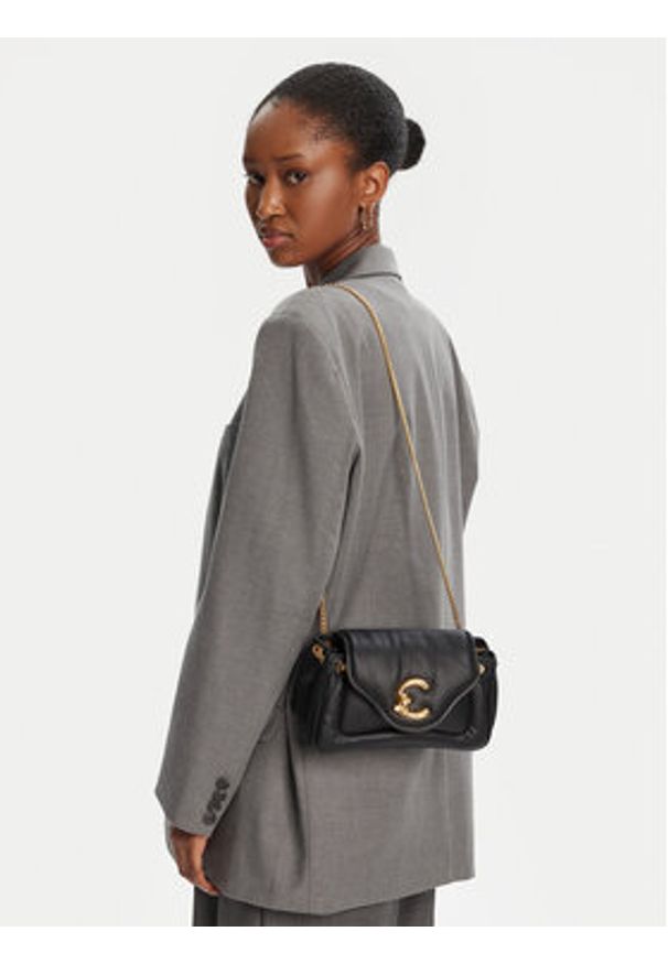 Coccinelle Torebka SUE Coccinelle C-Me Fluffy E1 SUE 12 02 01 Czarny. Kolor: czarny. Materiał: skórzane