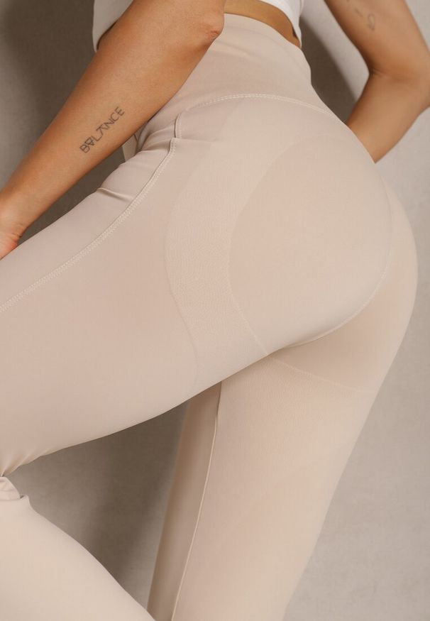 Renee - Beżowe Spodnie Dzwony High Waist Odavia. Okazja: na co dzień. Stan: podwyższony. Kolor: beżowy. Styl: elegancki, casual