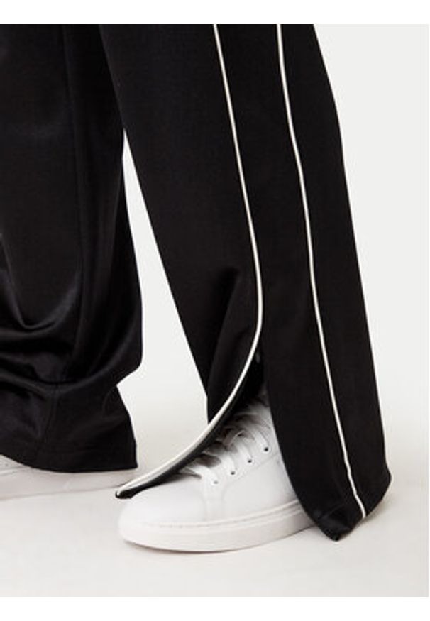 Hugo - HUGO Spodnie dresowe Neannet 50530669 Czarny Regular Fit. Kolor: czarny. Materiał: syntetyk