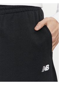 New Balance Spodnie dresowe MP41519 Czarny Relaxed Fit. Kolor: czarny. Materiał: bawełna, syntetyk