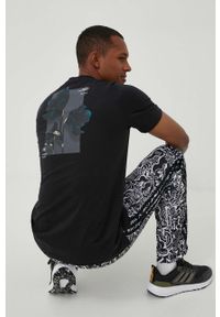 adidas Originals spodnie dresowe x Fewocious kolor czarny wzorzyste. Kolor: czarny. Materiał: dresówka. Wzór: aplikacja #2