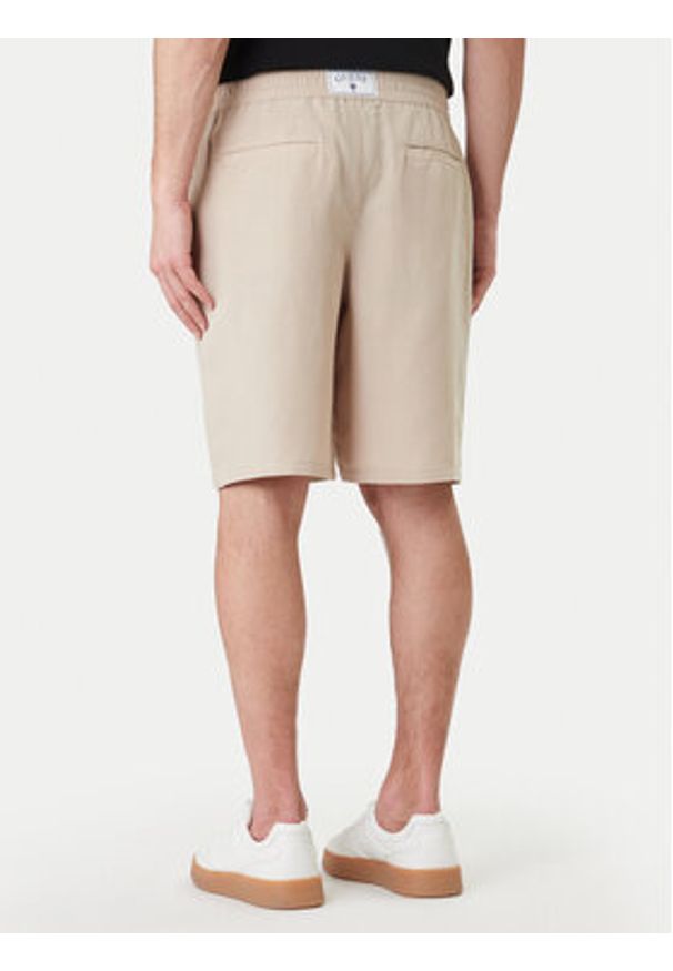Guess Szorty sportowe F6GD01 WN202 Beżowy Regular Fit. Kolor: beżowy. Materiał: syntetyk. Styl: sportowy