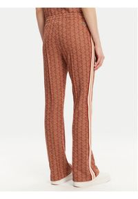 Lacoste Spodnie dresowe XF9313 Pomarańczowy Regular Fit. Kolor: pomarańczowy. Materiał: bawełna, syntetyk #4