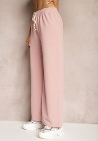 Renee - Różowe Spodnie z Szerokimi Nogawkami i Gumką w Talii Uxelia. Kolor: różowy. Styl: klasyczny, elegancki