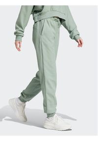 Adidas - adidas Spodnie dresowe IR8372 Zielony Regular Fit. Kolor: zielony. Materiał: syntetyk #6
