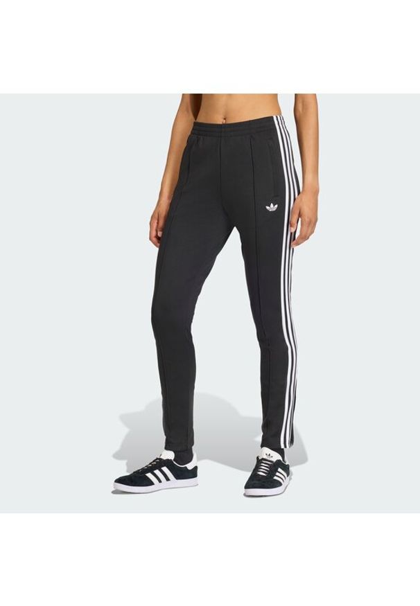 Adidas - adidas Spodnie dresowe adicolor SST Classic KD5570 Czarny Slim Fit. Kolor: czarny. Materiał: bawełna