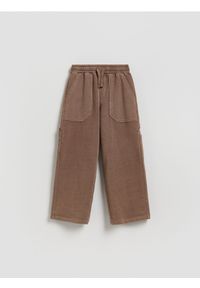 Reserved - Spodnie wide leg z efektem sprania - ciemnobrązowy. Kolor: brązowy. Materiał: dzianina, bawełna #1