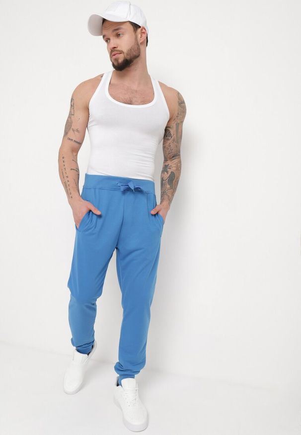 Born2be - Niebieskie Spodnie Dresowe z Wiązaniem w Pasie z Wyższym Stanem Aricasa. Stan: podwyższony. Kolor: niebieski. Materiał: dresówka