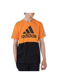 Adidas - Koszulka adidas Essentials Colorblock Single Jersey HE4328 - czarno-pomarańczowa. Kolor: wielokolorowy, pomarańczowy, czarny. Materiał: jersey. Długość rękawa: krótki rękaw. Długość: krótkie