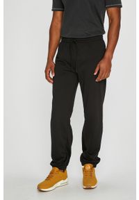 Kappa - Spodnie. Kolor: czarny. Materiał: bawełna, poliester, dzianina. Wzór: gładki #1