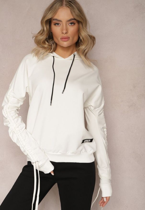 Renee - Biała Bluza Bawełniana z Kapturem Dolcean. Typ kołnierza: kaptur. Kolor: biały. Materiał: bawełna. Długość rękawa: długi rękaw. Długość: długie