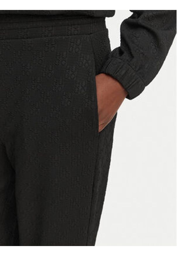 Hugo - HUGO Spodnie dresowe 50557488 Czarny Regular Fit. Kolor: czarny. Materiał: syntetyk