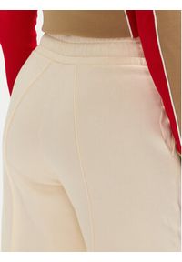 Fila Spodnie dresowe Lauka FAW0910 Écru Wide Leg. Materiał: bawełna