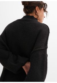 bonprix - Sweter z dzianiny o luźnym splocie. Typ kołnierza: kołnierzyk stójkowy. Kolor: czarny. Materiał: dzianina. Wzór: ze splotem #3