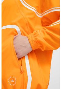 Adidas by Stella McCartney - adidas by Stella McCartney wiatrówka TruePace kolor pomarańczowy przejściowa oversize. Kolor: pomarańczowy. Materiał: materiał #5
