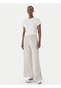 Adidas - adidas Spodnie dresowe Seasonal Essentials Colourpop JZ0192 Beżowy Regular Fit. Kolor: beżowy. Materiał: bawełna #5