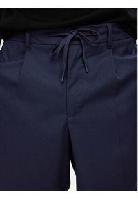 Selected Homme Spodnie materiałowe 16094358 Granatowy Tapered Fit. Kolor: niebieski. Materiał: syntetyk, wiskoza