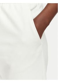 Lacoste Spodnie dresowe XF5268 Biały Regular Fit. Kolor: biały. Materiał: bawełna #3