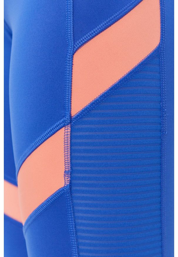 Reebok - Legginsy. Kolor: niebieski. Materiał: skóra