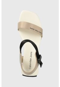 Calvin Klein Jeans sandały WEDGE BLCOK SANDAL SATIN/HW damskie kolor biały na platformie YW0YW00980. Zapięcie: klamry. Kolor: biały. Materiał: włókno, materiał. Obcas: na platformie #4