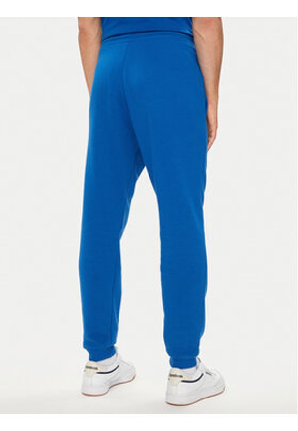 Reebok Spodnie damskie Small Logo Fleece 100202849 Niebieski Regular Fit. Kolor: niebieski. Materiał: bawełna