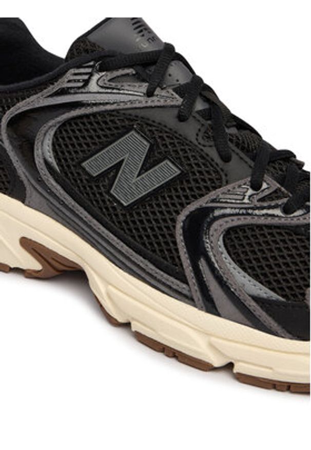 New Balance Sneakersy U5309TN Czarny. Kolor: czarny. Materiał: skóra, zamsz