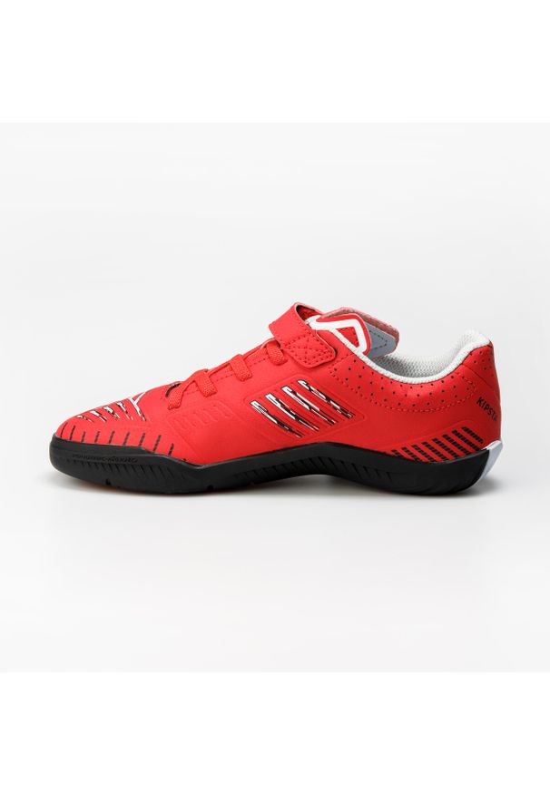 KIPSTA - Buty do piłki nożnej halowej dla dzieci Kipsta Ginka 500. Kolor: szary, niebieski, czerwony, czarny, wielokolorowy. Materiał: syntetyk, kauczuk, poliester. Wzór: gładki. Sport: piłka nożna