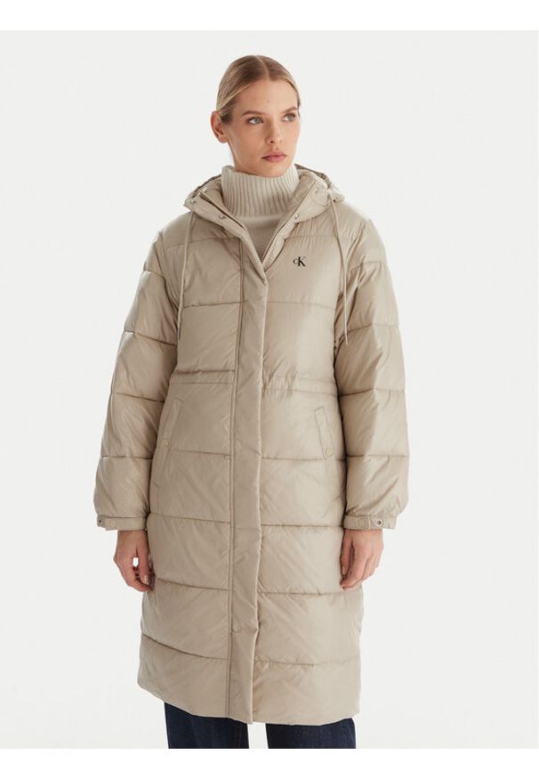 Calvin Klein Jeans Kurtka zimowa LV047D506G Beżowy Relaxed Fit. Kolor: beżowy. Materiał: syntetyk. Sezon: zima