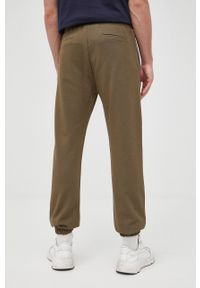 Trussardi Jeans - Trussardi spodnie bawełniane męskie kolor zielony melanżowe. Kolor: zielony. Materiał: bawełna. Wzór: melanż