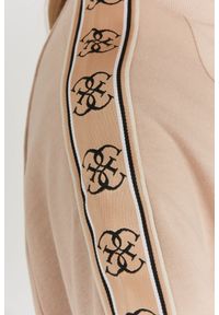 Guess - GUESS Beżowa bluza damska z lampasami w logo. Kolor: beżowy. Materiał: bawełna. Wzór: aplikacja #6